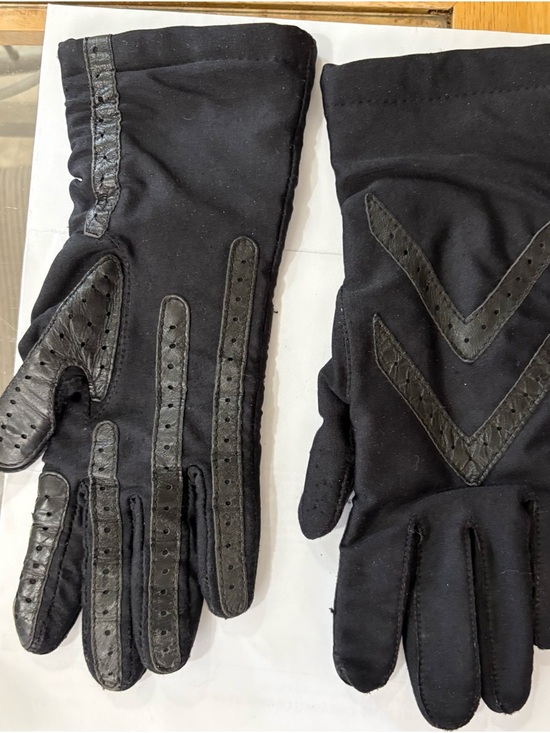 isotoner Accessories - Female Black Dress Gloves with Leather Trim can fit to medium hands.